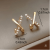 Elegant Geometric Cross Design Earrings